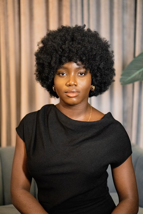 Feyisayo Enuiyin speaking on stage