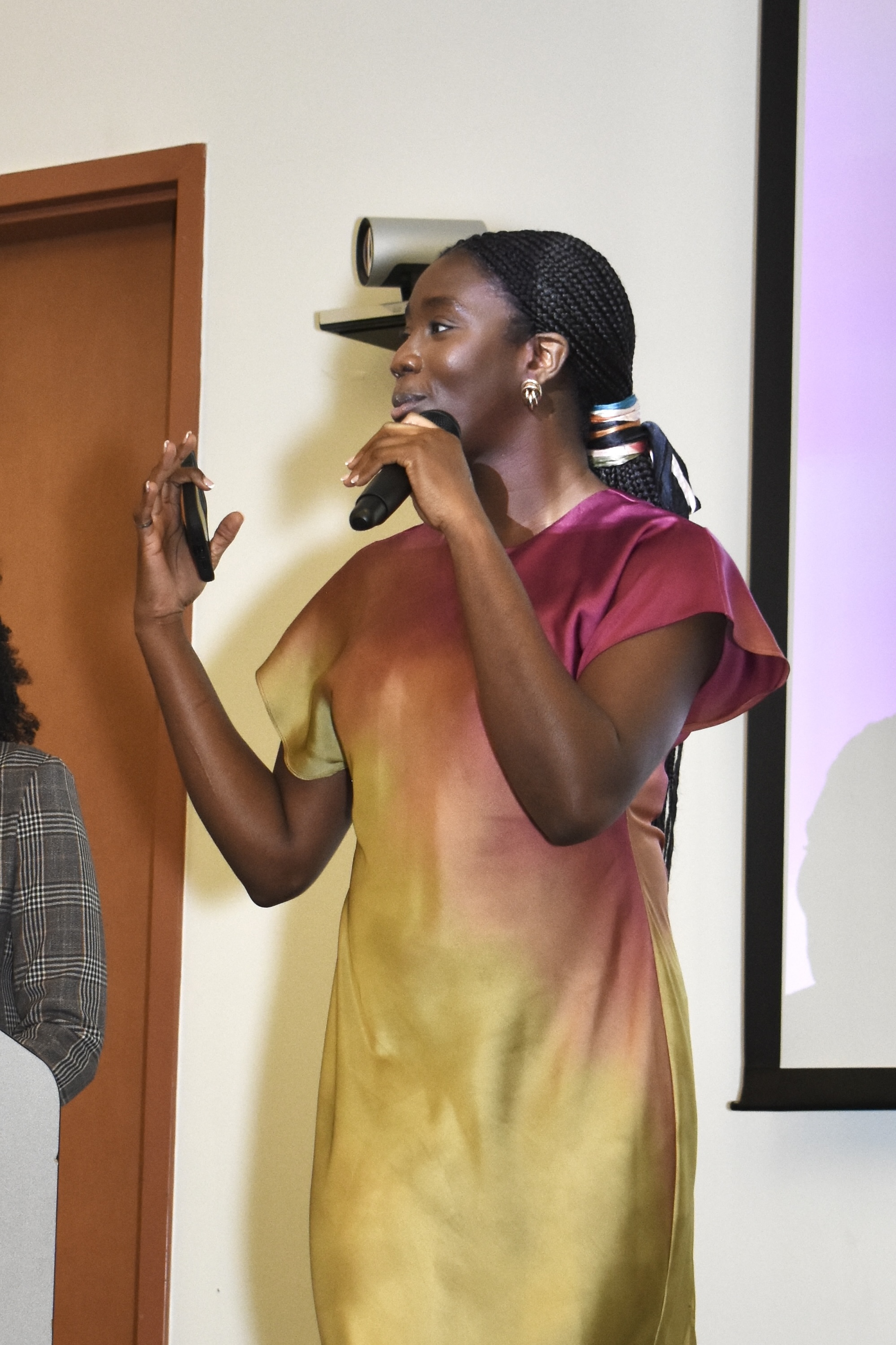 Feyisayo Enuiyin speaking on stage